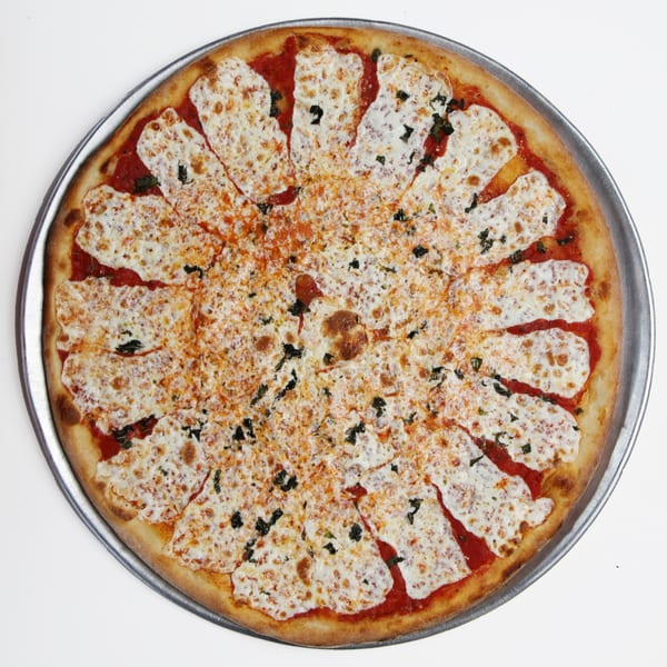 Fort Lee Pizzeria's whole Margherita pizza, sliced into many small pieces, on a metal tray.